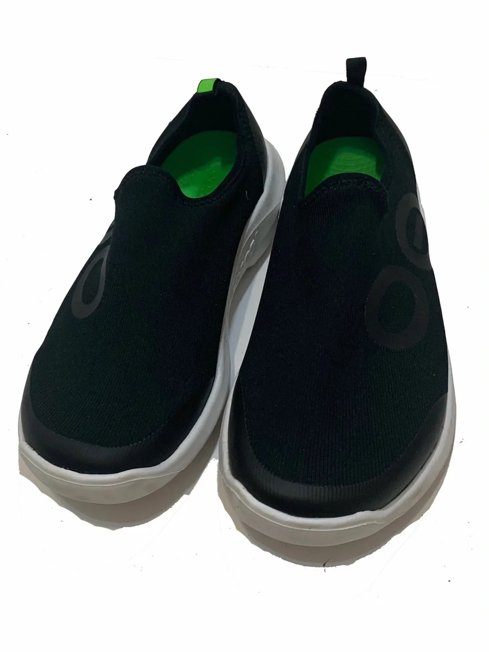 9 / OOFOS slip-on sneakers